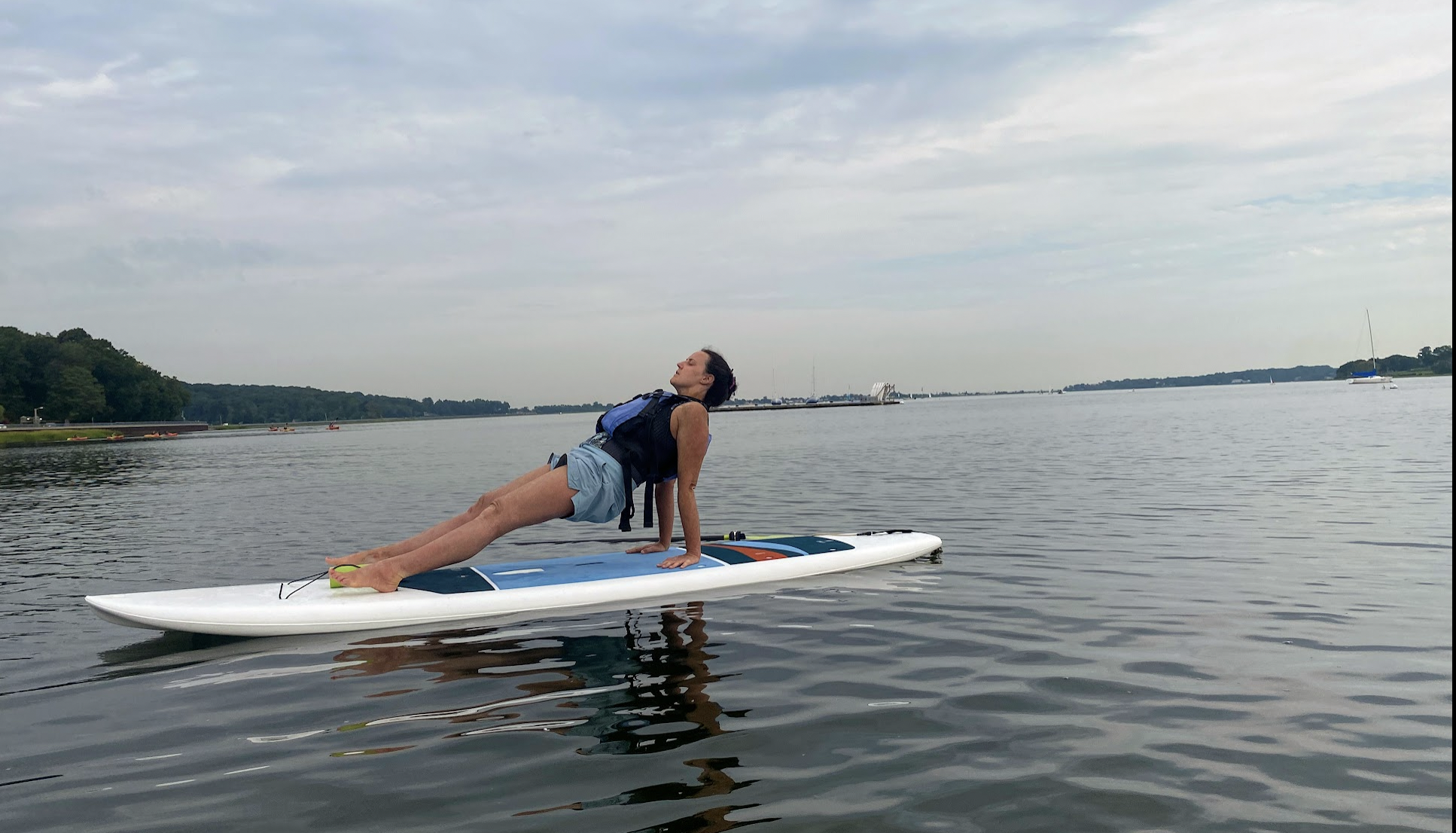 Gina Sipley on a Paddle Board in Oyster Bay