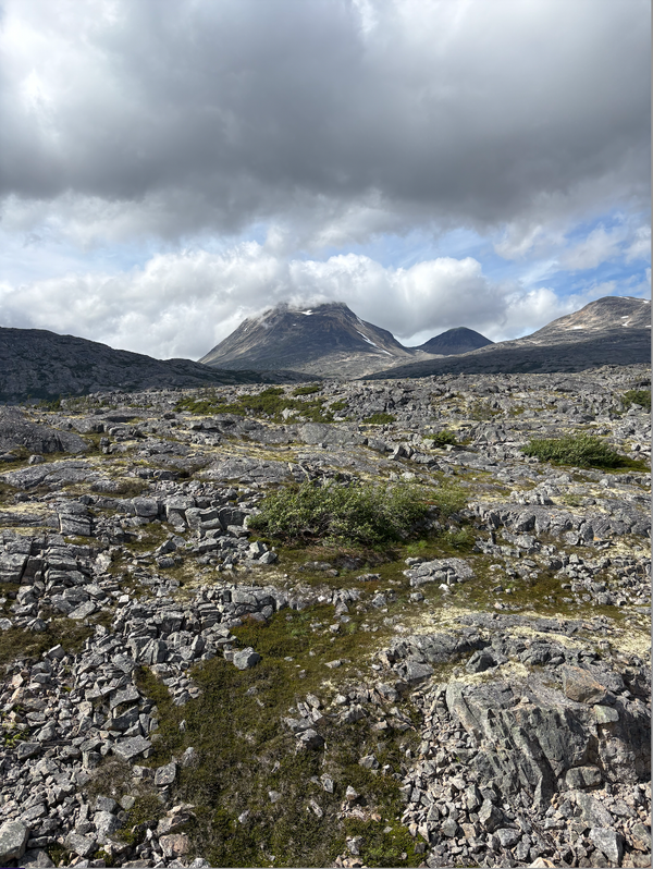 Rocky scramble towards the top of a Mountain